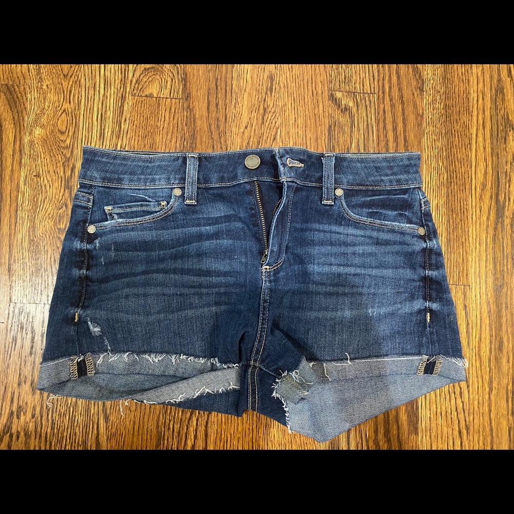 Paige distresses Jean shorts